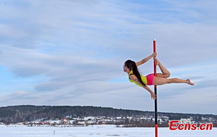 Pole dancers perform in China's North Pole