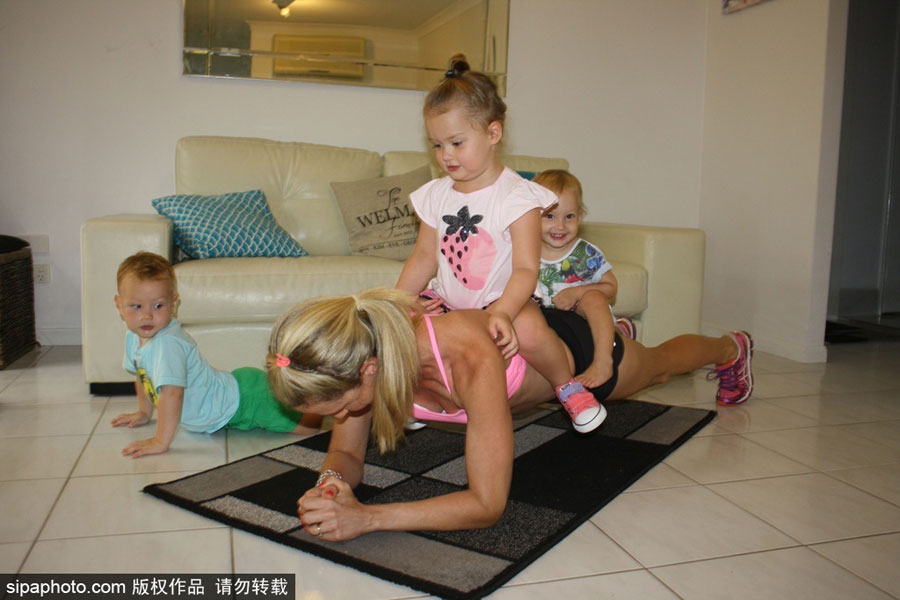 Super fit mother works out with her three children