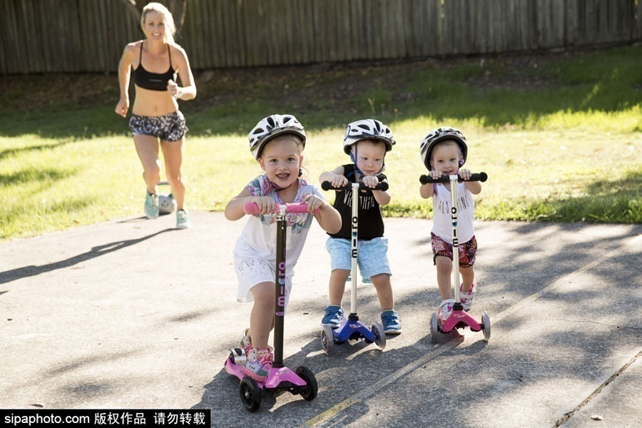 Super fit mother works out with her three children
