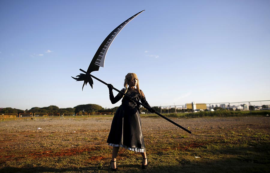 Cosplay enthusiasts pose during 'Anime Friends' in Brazil