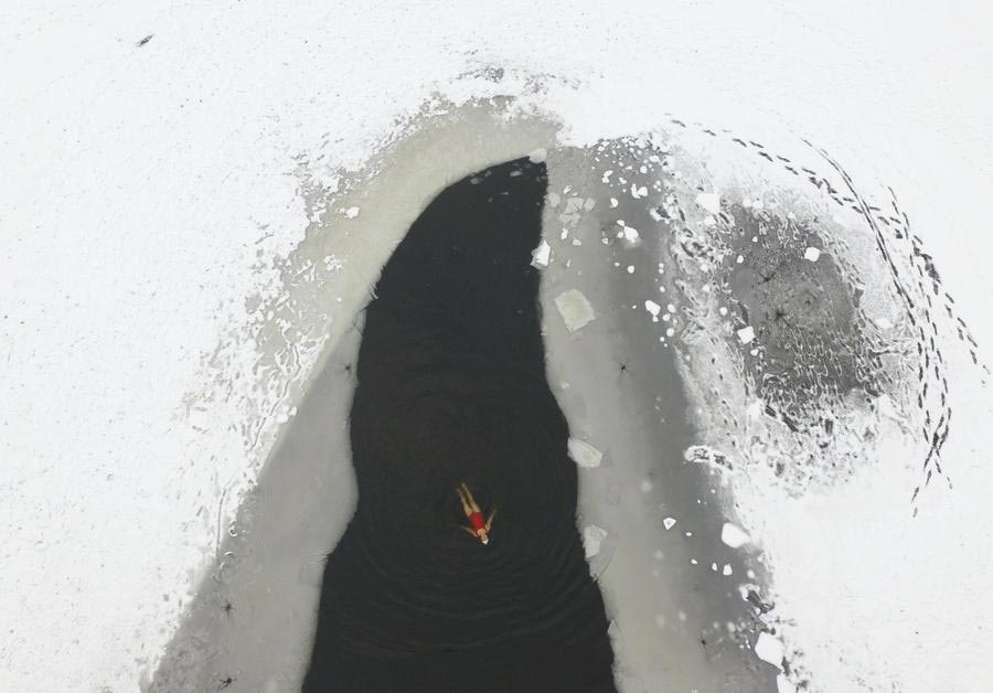 Woman's winter swimming photo listed in Reuters 2015 best aerial photos