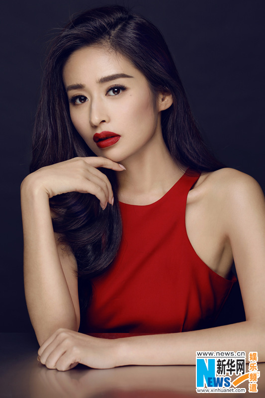 Actress Ying Er poses in red dress to welcome Year of the Monkey