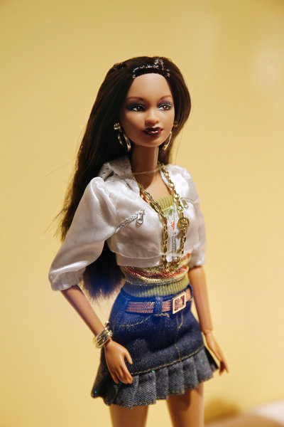 Barbie, no warts and all, comes to Paris