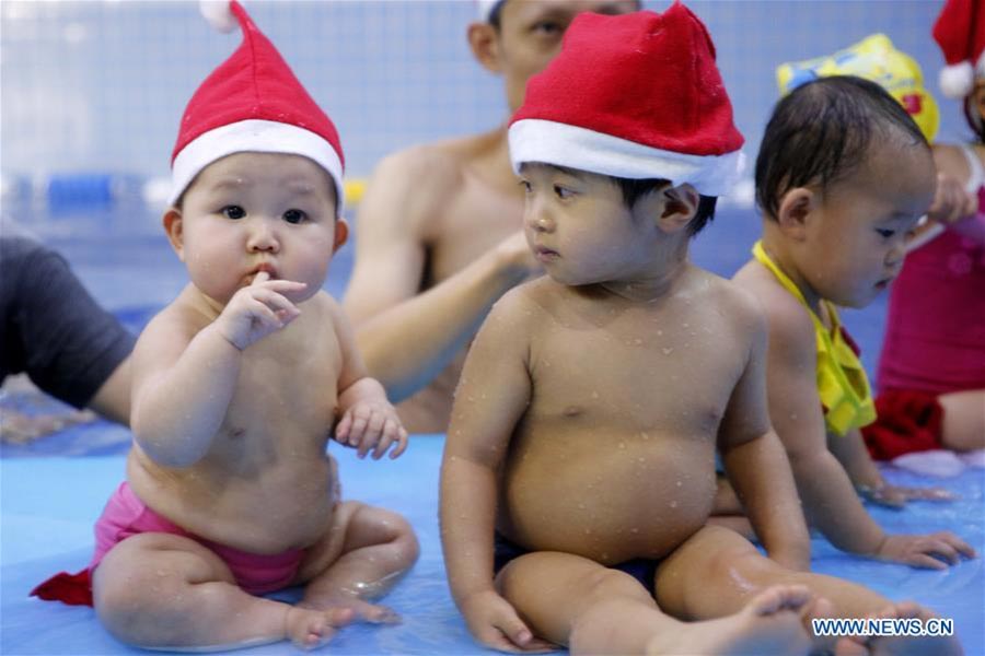 Babies in Beijing's Christmas swimming party