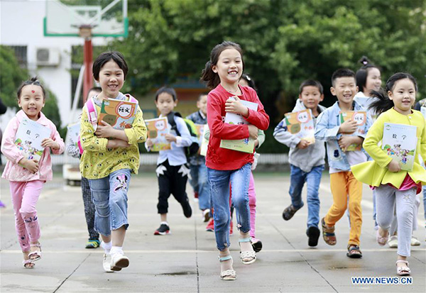 New curriculum, text books as Chinese schools start academic year