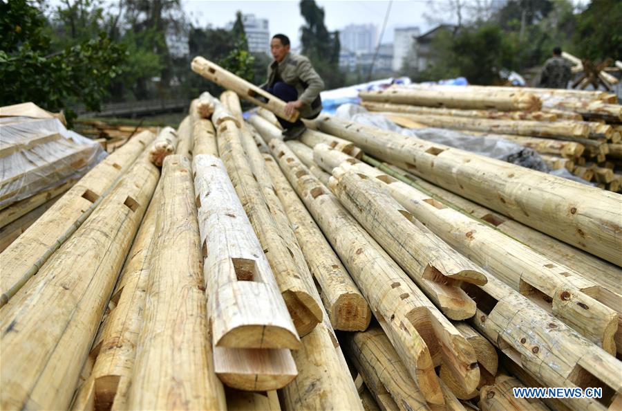 Architect of stilted house of Tujia people