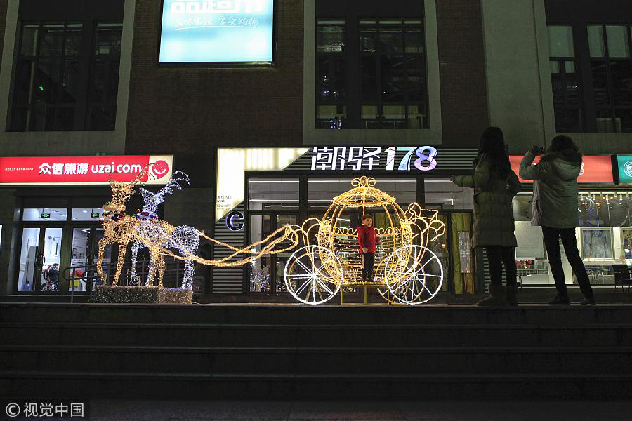 Christmas decorations illuminate Beijing