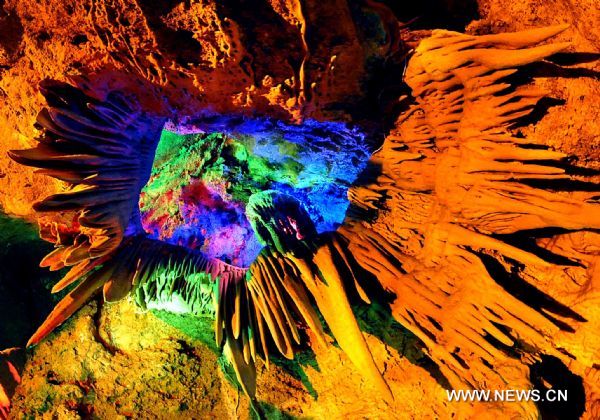 Karst cave in central China attracts visitors