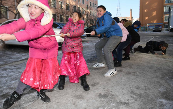 Leftover children look forward to family reunion before Spring Festival