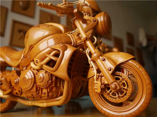 Jilin man turns wood into miniature motorcycles