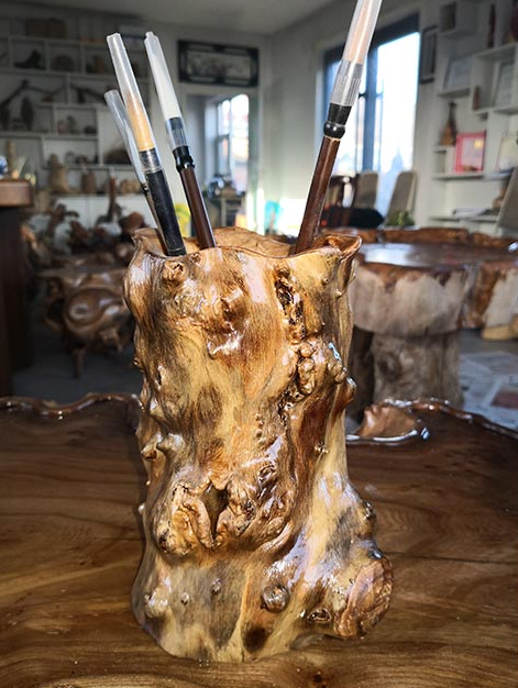 Anything but the pits: Jilin man turns fruit pieces into art