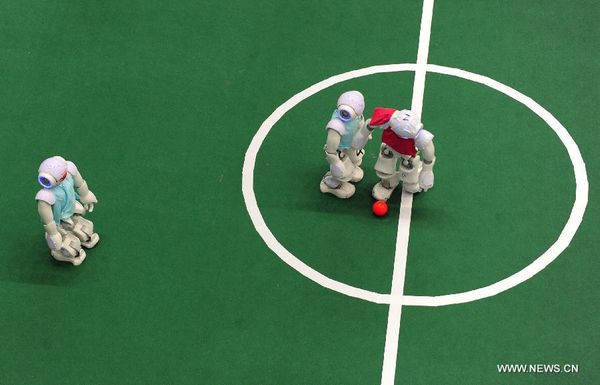 Robots kick off soccer match in E China