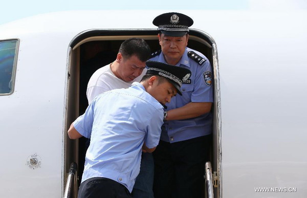 Corruption suspect Yang Jinjun repatriated in Fuzhou