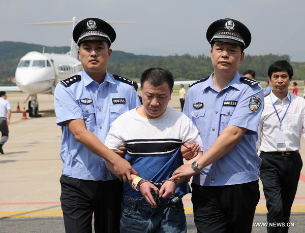 Corruption suspect Yang Jinjun repatriated in Fuzhou