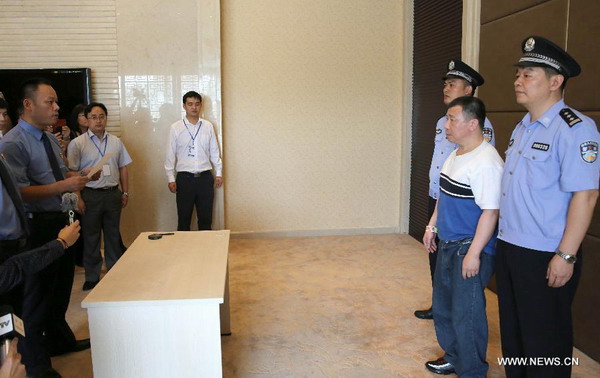 Corruption suspect Yang Jinjun repatriated in Fuzhou