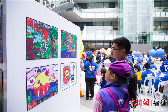 Art exhibition calls on more care for autistic children