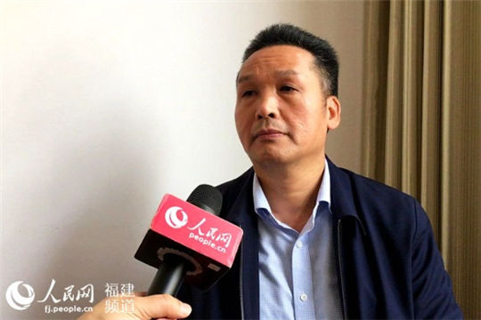 NPC deputy calls for efforts to protect folk buildings
