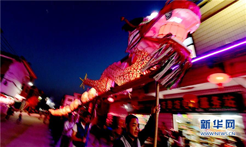 Lantern parade celebrates Lantern Festival in ancient village