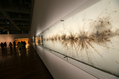 Quanzhou artist has gunpower artwork on display in Suzhou