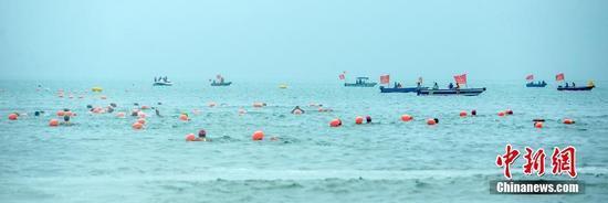 Open water swimming race makes a splash in Pingtan