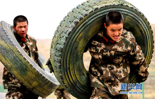 Popeye-like soldiers practice with tires