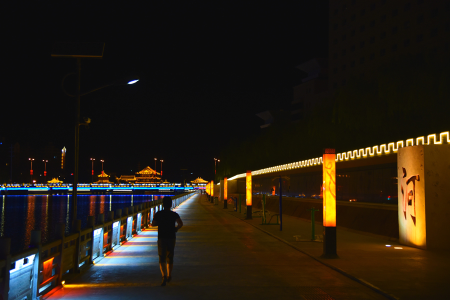 Vibrant night cityscape of Gansu's Dunhuang city