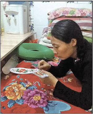 Providing for her family with handicrafts