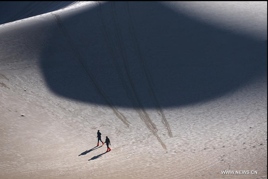 Scenery of crescent spring of Mingsha Hill in Dunhuang