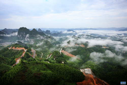 Mountains submerged in fog