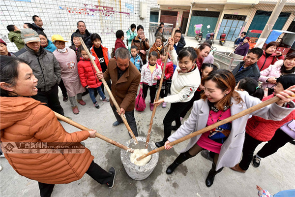 Hechi prepares for Spring Festival through age-old customs