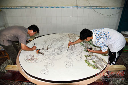 Huge hand-painted mooncake for the festival