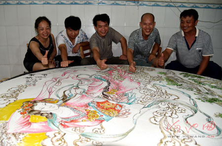 Huge hand-painted mooncake for the festival