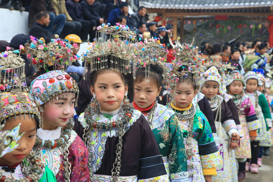 Dong people perform for traditional New Year festival