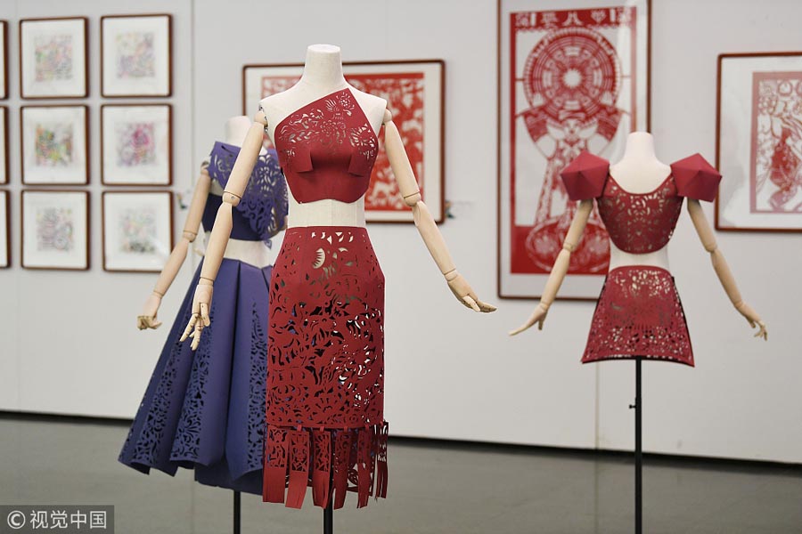 Exhibition in Guiyang blends traditional paper-cutting with fashion