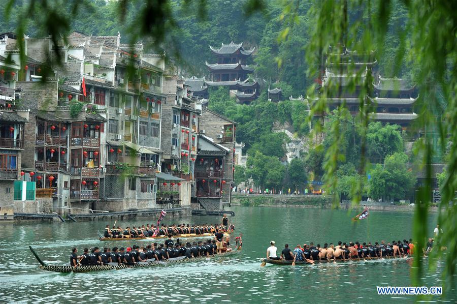 Training for dragon boat race held on Wuyang River in Guizhou