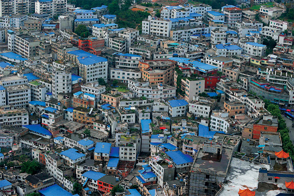 Blue tin roofs spring up in Guiyang