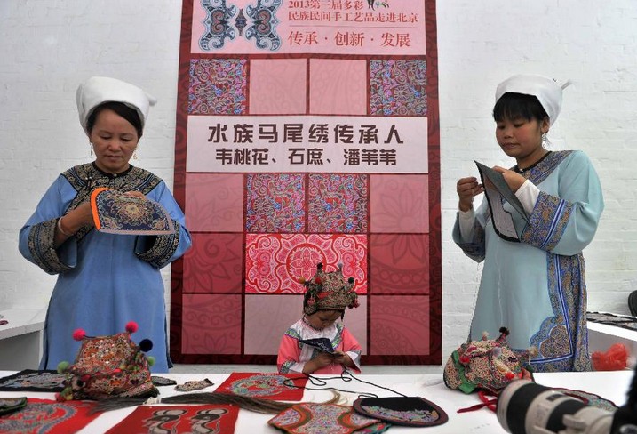 Folk handicrafts made in SW China's Guizhou Province displayed in Beijing