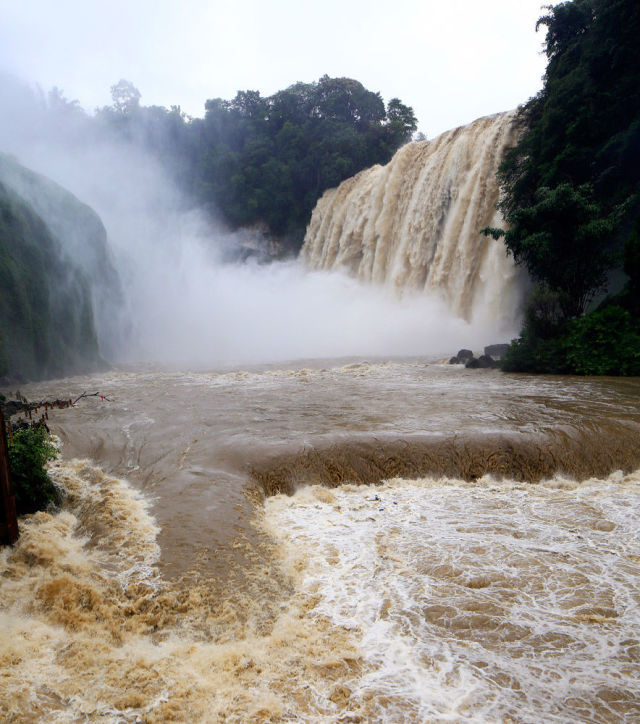 Big water flow makes Huangguoshu Waterfall more beautiful