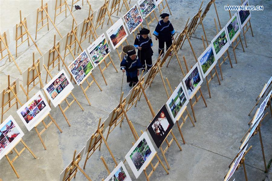 Photo exhibition on customs, life of villagers held in S.W. China