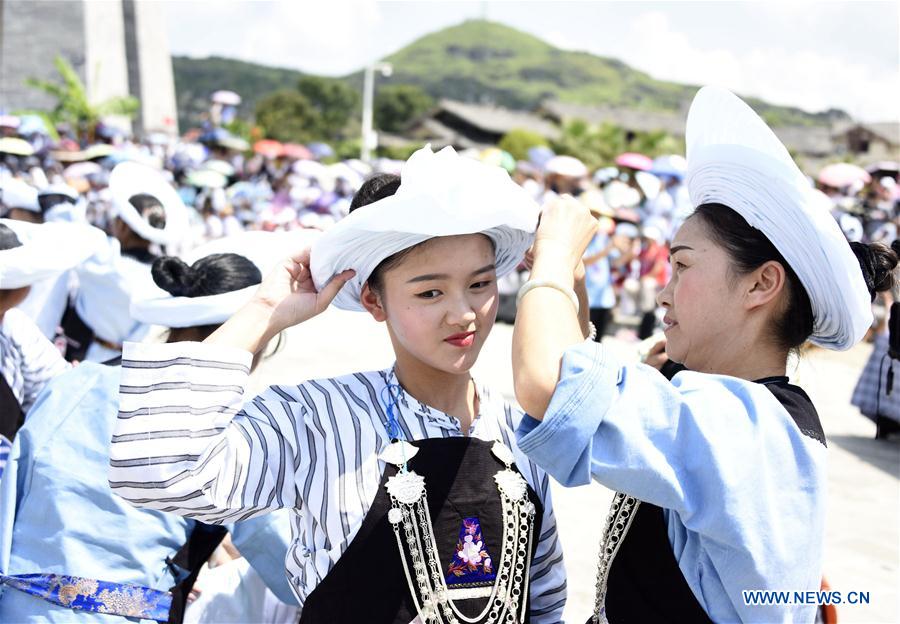 Bouyei ethnic group hold headscarves contest in SW China's Guizhou