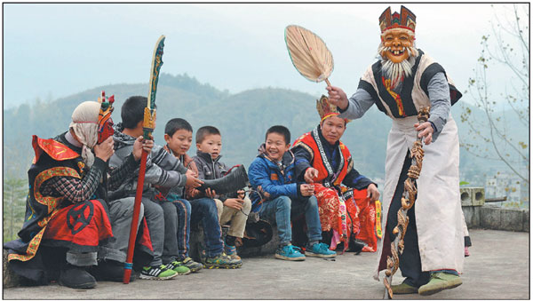 Guizhou artisan strikes gold making faces