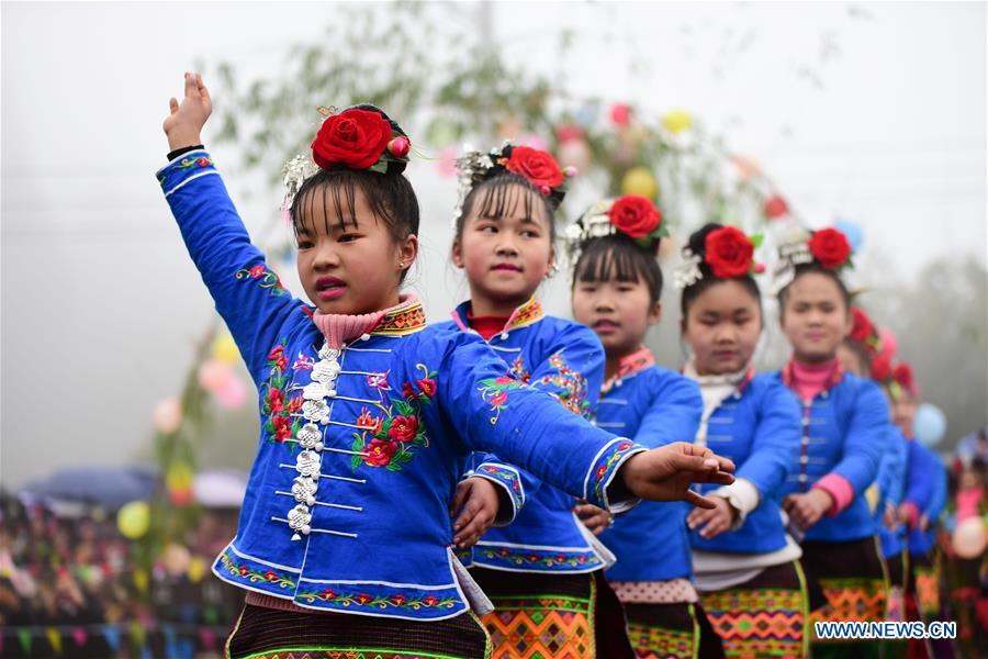 Miao people perform folk dance to celebrate Chinese Lunar New Year in China's Guizhou