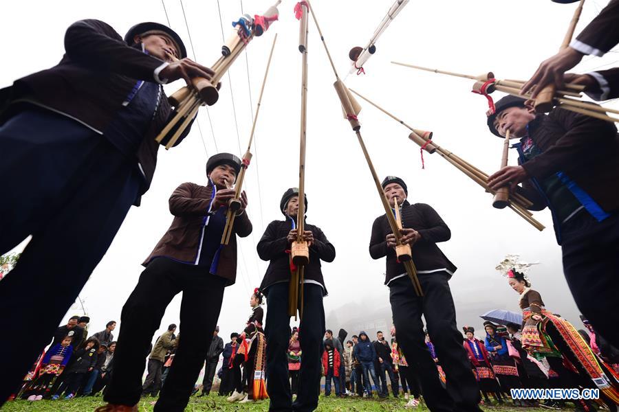 Miao people perform folk dance to celebrate Chinese Lunar New Year in China's Guizhou