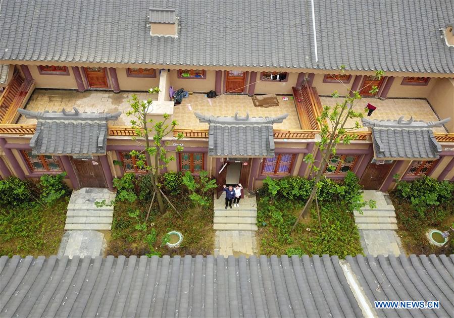 Poverty-stricken families in Guizhou moves into new houses with help of local government