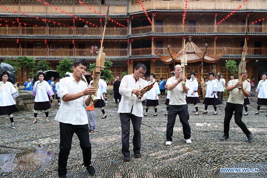 Local people of Dong ethnic group attend gathering to mark Xiangsi Festival in Guizhou