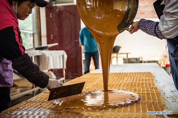 Brown sugar industry helps local people increase income in SW China's Guizhou