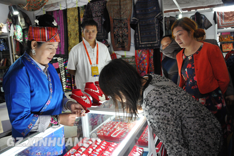 Miao ethnic group devote themselves to traditional embroidery