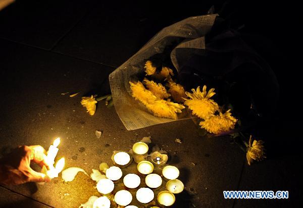 Candles lighted up to mourn for Zhouqu mudslide victims