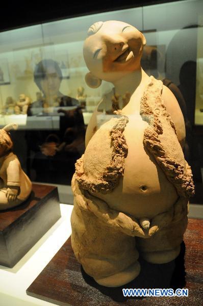 Mud sculptures feature country lives Hebei