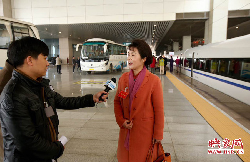 Henan NPC members set out for annual session